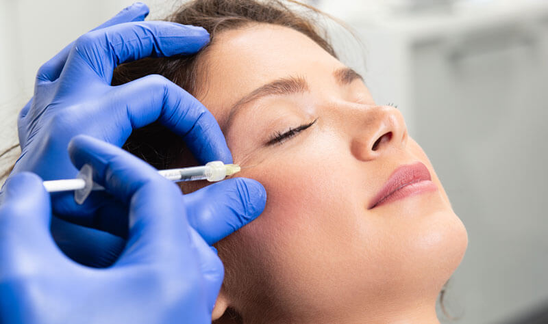 A client undergoing Anti-wrinkle treatment injections in Chichester, West Sussex